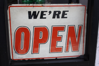 We're Open sign