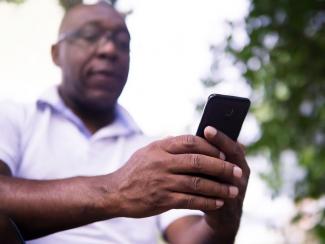 Man looking at cell phone