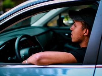 Person driving a car