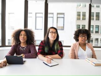 Women at conference table