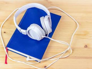 Notebook and headphones