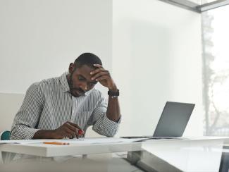 A man sitting while working