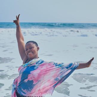 Woman smiling at beach