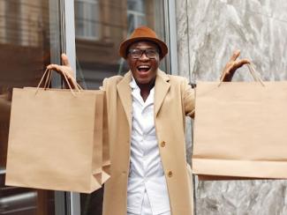 Man holding shopping bags