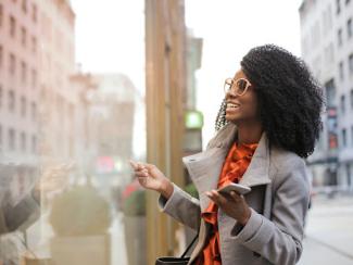 Woman smiling on the street