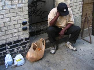Man sitting on doorstep