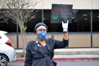 Person protesting evictions