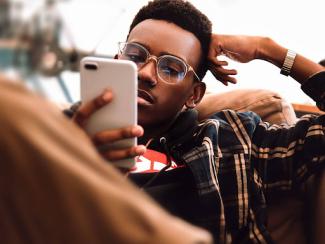 Man looking at cell phone