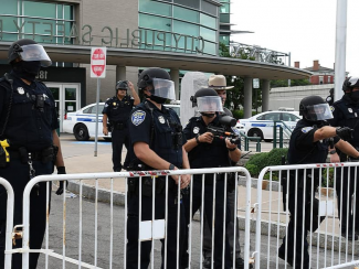 Police guarding baracade 