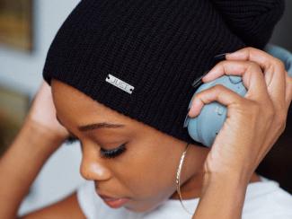 Person wearing headphones over ears