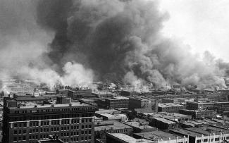 Skyline view of Tulsa race riot flames