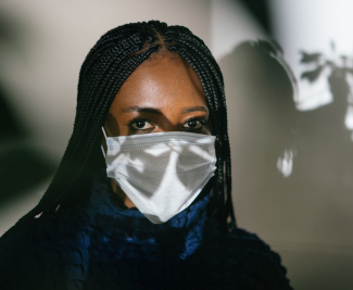 Woman with medical face mask on