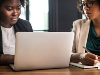 Women working in front of laptop