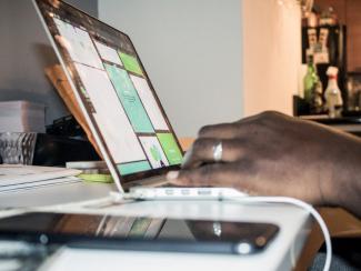 Man typing on computer