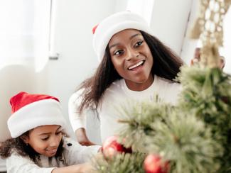 Kids decorating Christmas tree