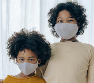 Children with face masks on