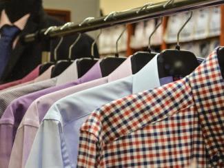 Men's shirts hanging on rack