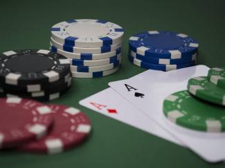 Playing cards and chips on casino table
