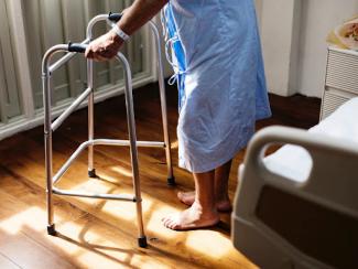 Hospital patient using walker