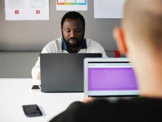 Man working on laptop computer