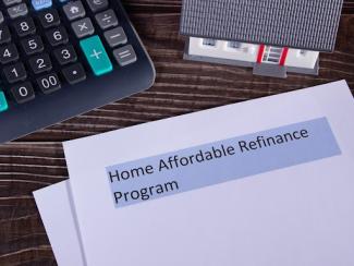 Calculator and documents on desk