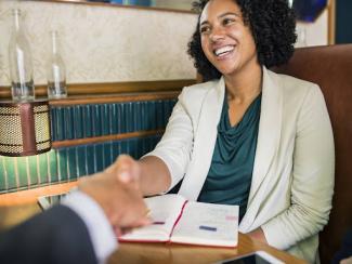 Woman shaking hands