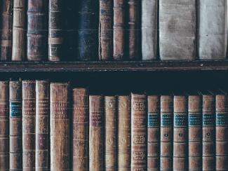 older books on a bookshelf