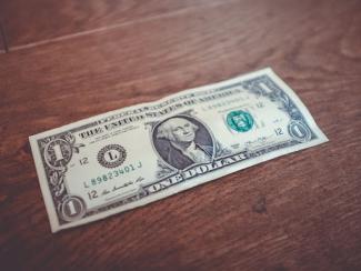 dollar bill on a table