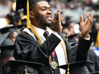 college graduate clapping