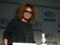 ruth carter standing up smiling