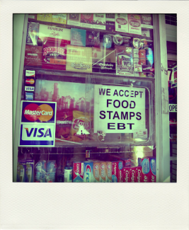 brooklyn deli door with sign that says we accept food stamps ebt