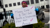 Man holding sign