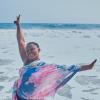 Woman smiling at beach