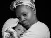 Woman holding an infant child