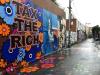 Tax The Rich mural by Megan Wilson
