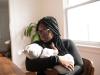 Woman holding child