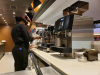 Barista making coffee