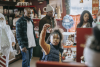 black family choosing christmas souvenirs