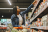 a woman shopping in a grocery store