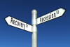street sign that says recovery and recession