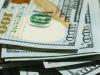 stack of one hundred dollar bills